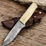 Handmade Damascus hunting knife with twist-pattern Damascus steel blade, camel bone handle, and genuine leather sheath.