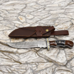 Handmade Damascus style hunting knife with wood handle and leather sheath